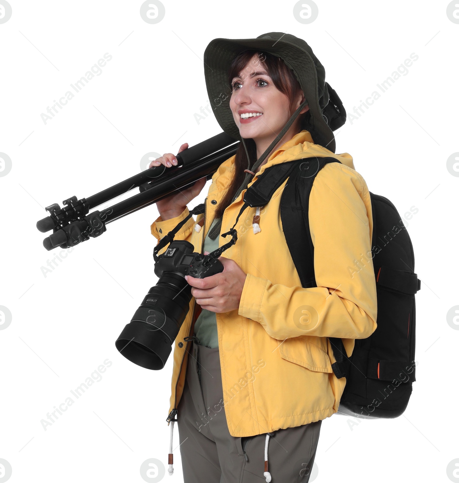 Photo of Photographer with backpack, camera and other professional equipment on white background