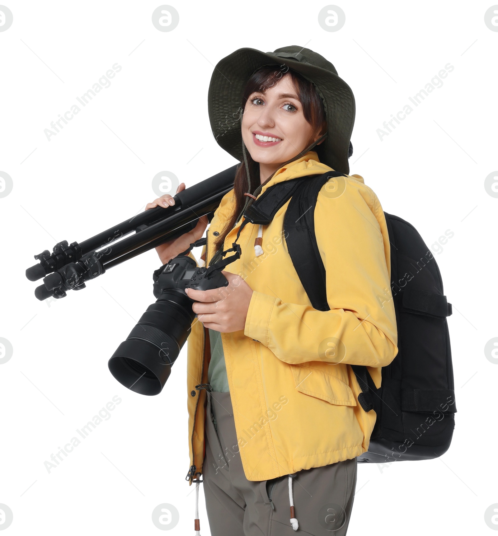 Photo of Photographer with backpack, camera and other professional equipment on white background