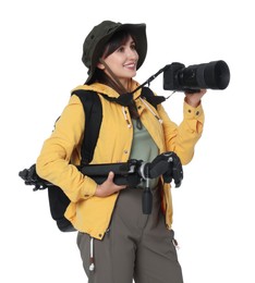 Photographer with backpack, camera and other professional equipment on white background