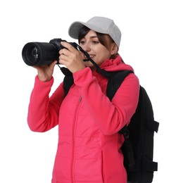 Photographer with backpack and camera taking picture on white background