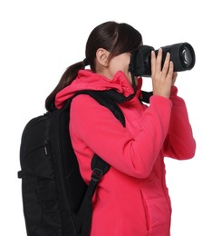 Photo of Photographer with backpack and camera taking picture on white background