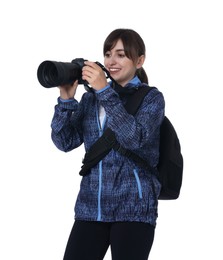 Photo of Photographer with backpack and camera taking picture on white background