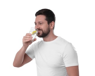 Happy man drinking water with lemon on white background