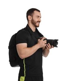 Photographer with backpack and camera on white background