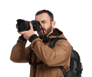 Photo of Photographer with backpack and camera taking picture on white background