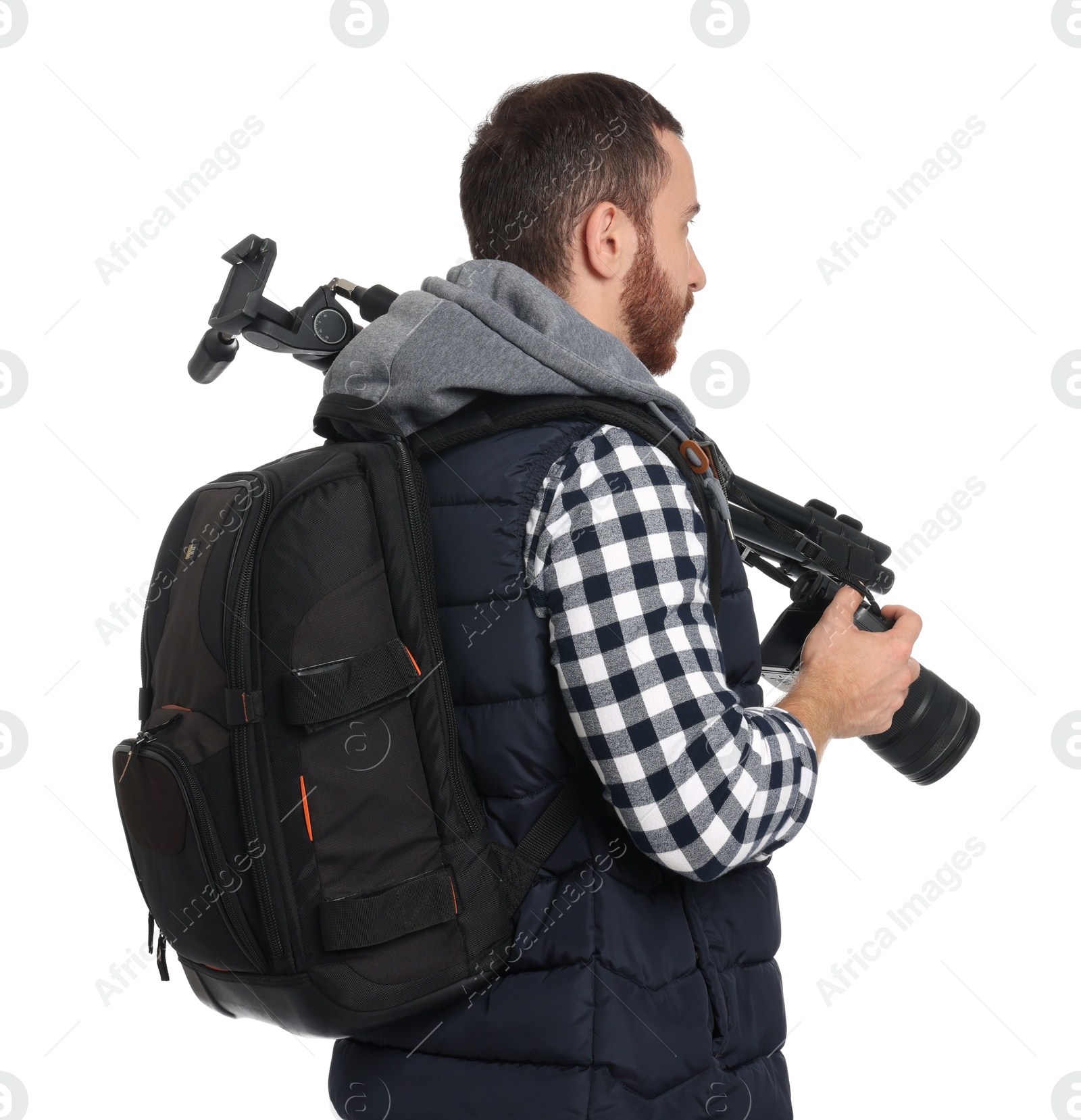 Photo of Photographer with backpack and camera on white background, back view