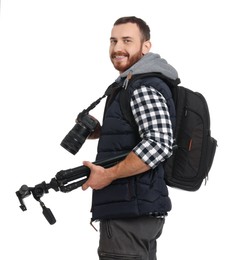 Photographer with backpack and camera on white background