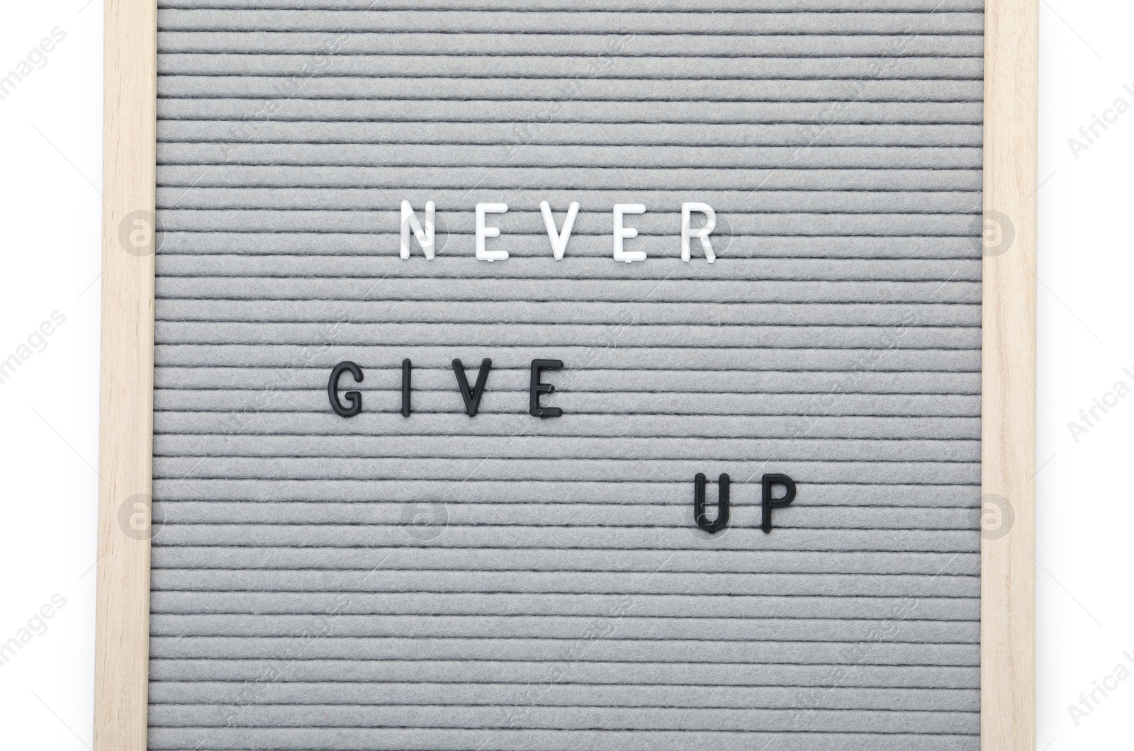 Photo of Letter board with phrase Never give up on white background, top view