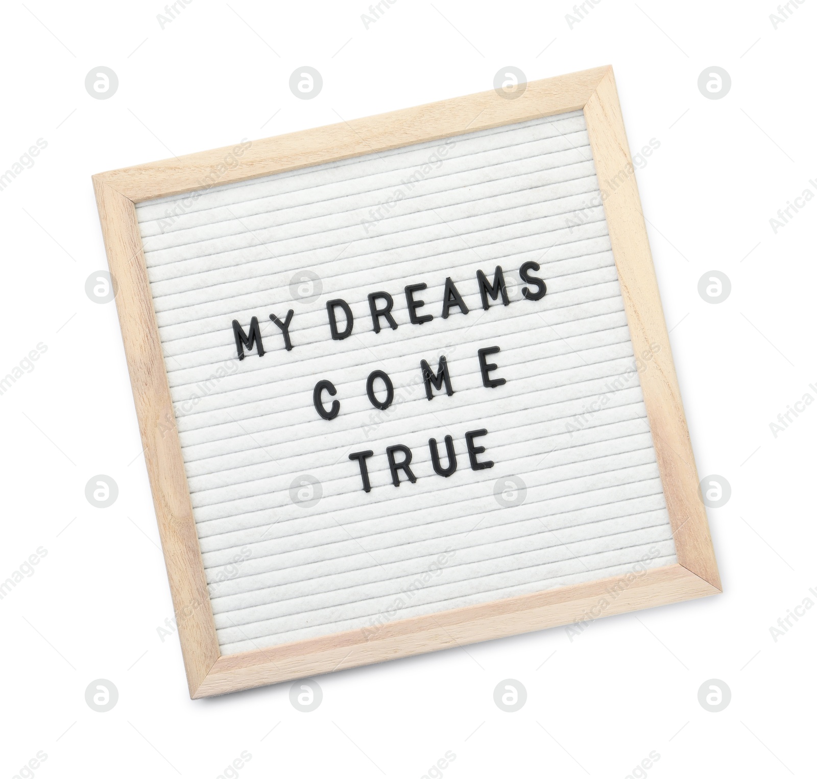 Photo of Letter board with phrase My dreams come true on white background, top view