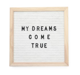 Photo of Letter board with phrase My dreams come true on white background, top view