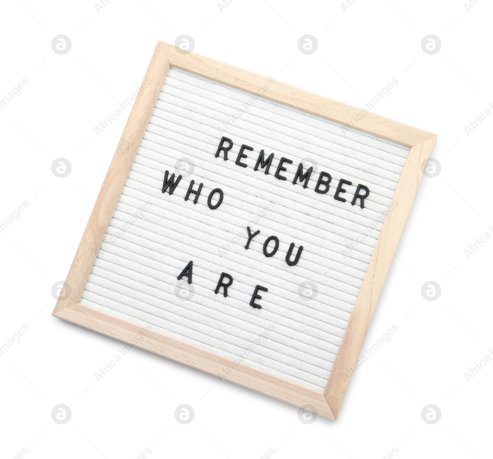 Photo of Letter board with phrase Remember who you are on white background, top view