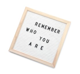 Letter board with phrase Remember who you are on white background, top view