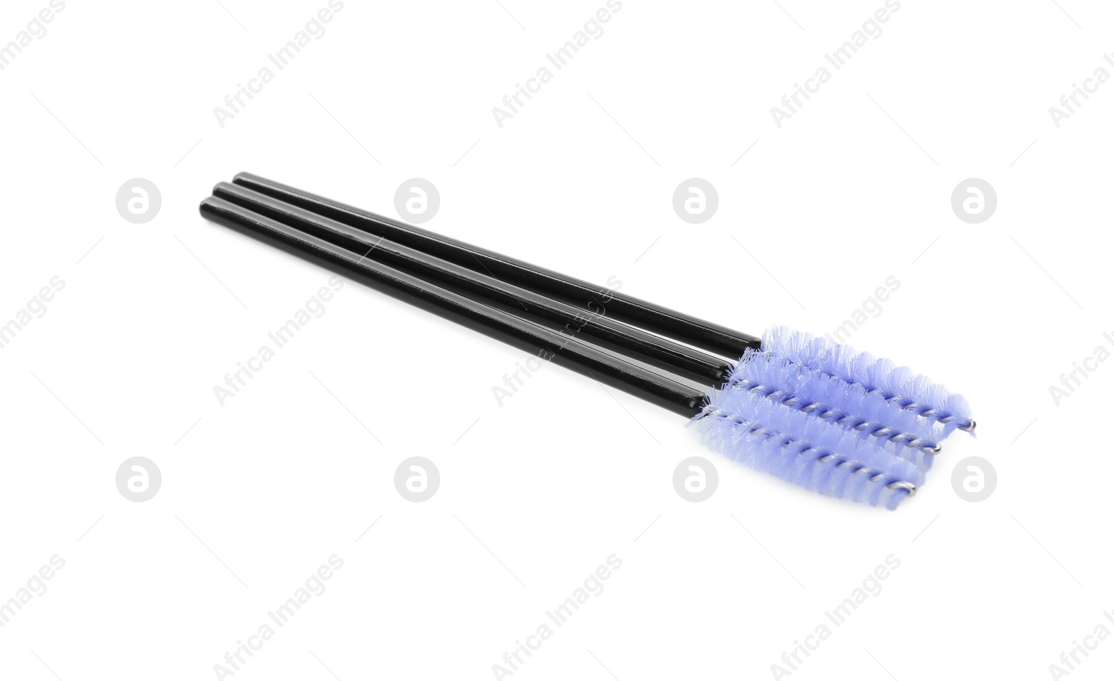 Photo of Many disposable makeup brushes isolated on white