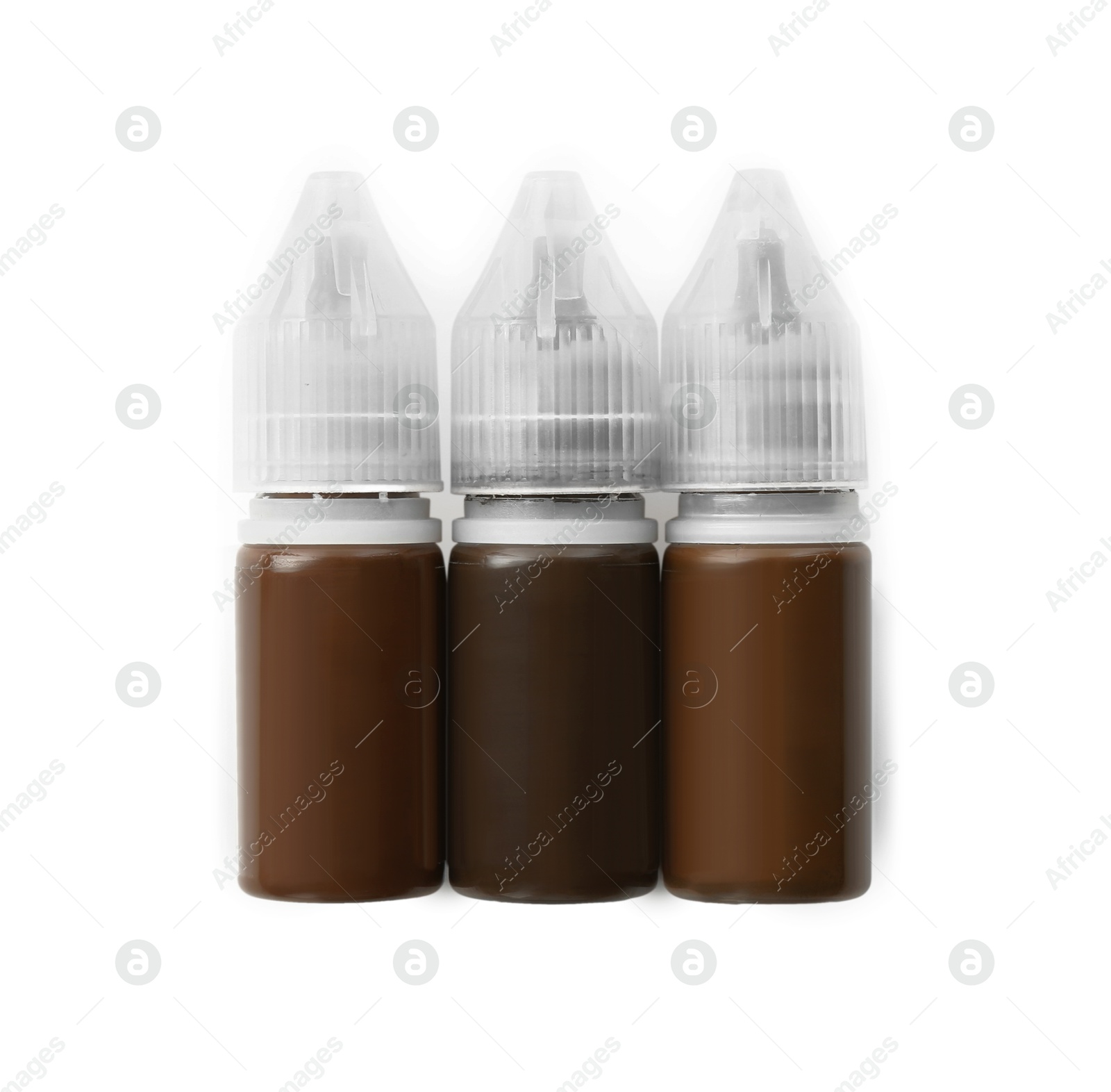 Photo of Bottles of pigments for permanent makeup isolated on white, top view