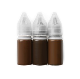 Photo of Bottles of pigments for permanent makeup isolated on white, top view