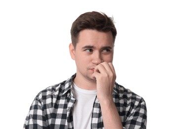 Portrait of scared young man on white background