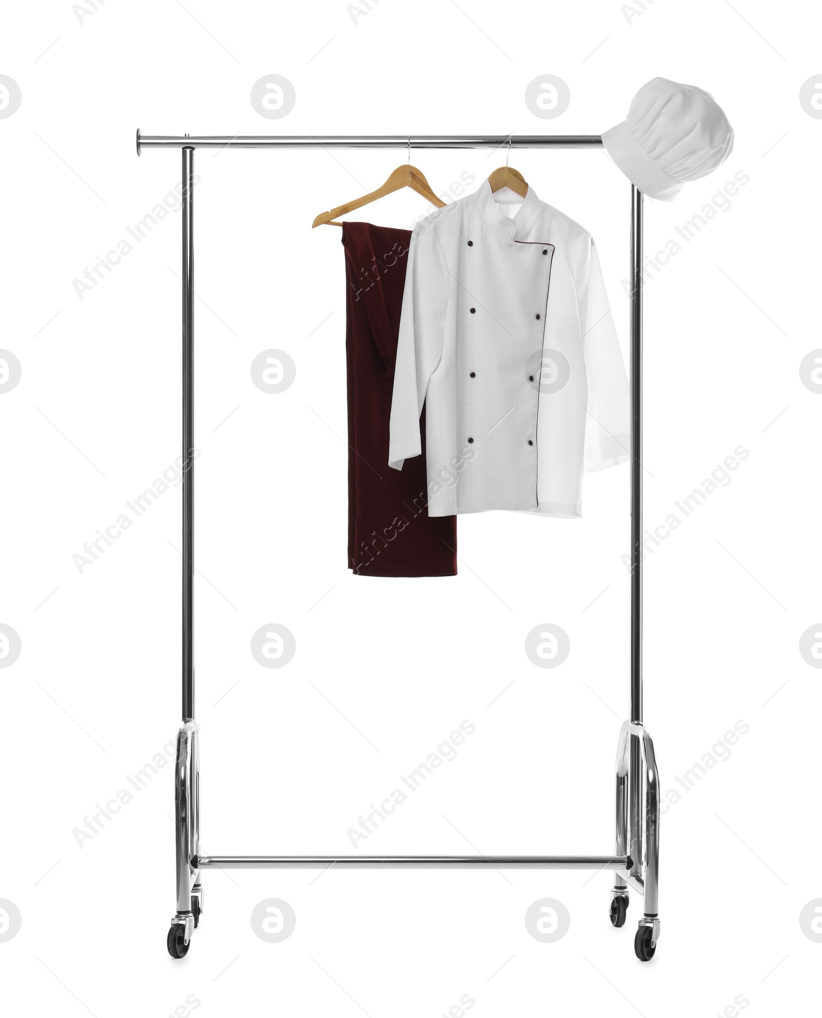 Photo of Chef's uniform on clothing rack against white background