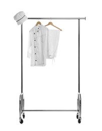 Photo of Chef's uniform on clothing rack against white background