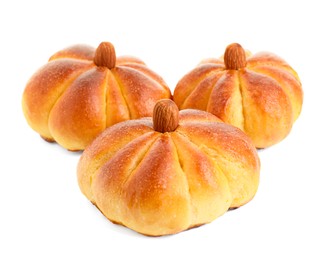 Photo of Tasty pumpkin shaped buns isolated on white