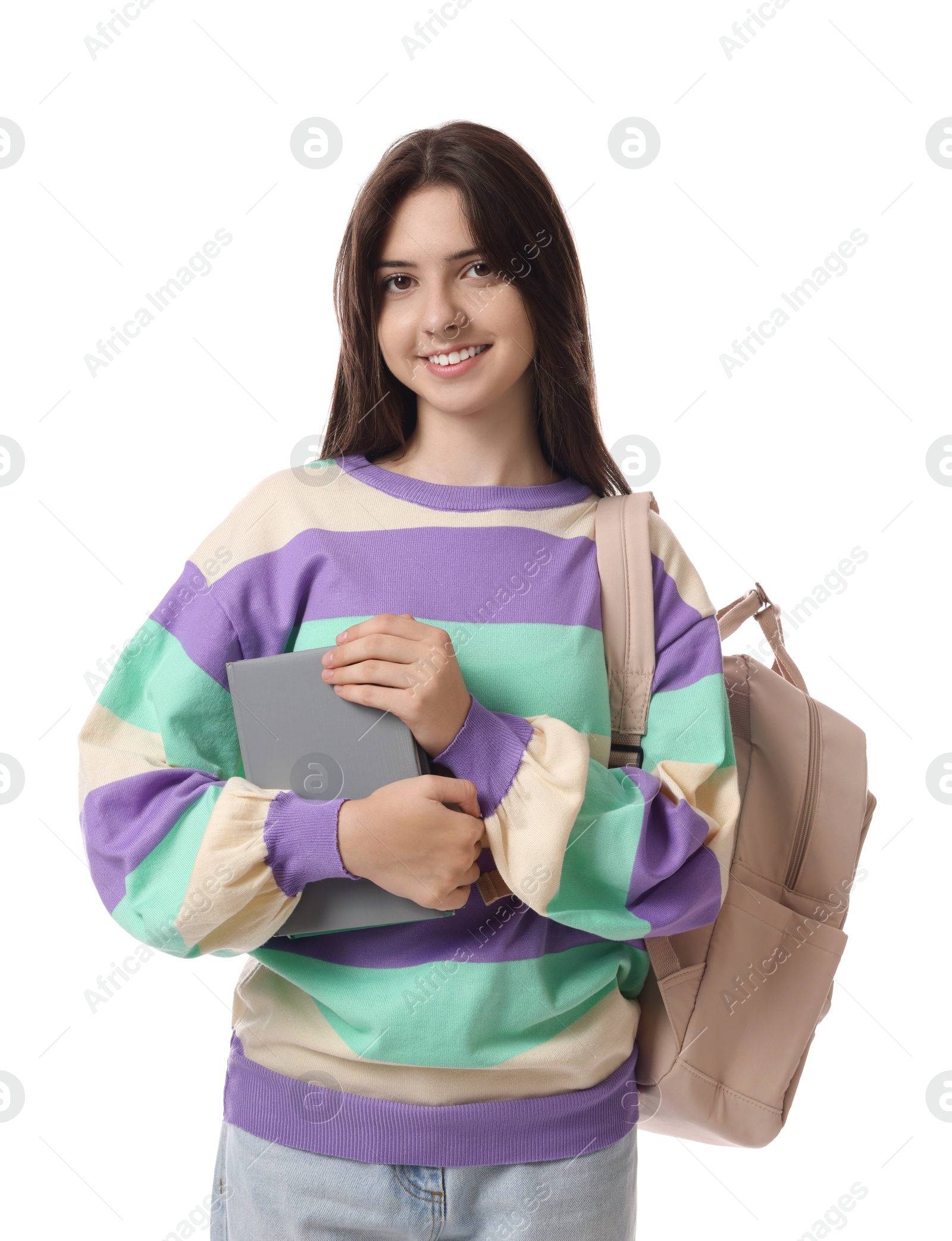 Photo of Portrait of smiling teenage girl with backpack and books on white background