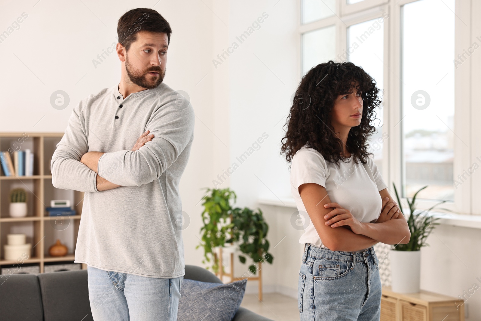 Photo of Couple having quarrel at home. Relationship problems