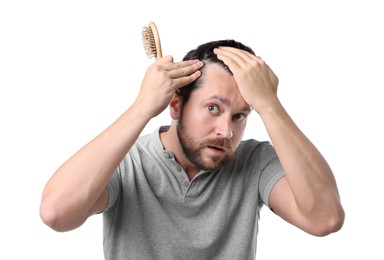 Man with hair loss problem on white background