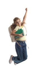 Girl with backpack and books jumping on white background