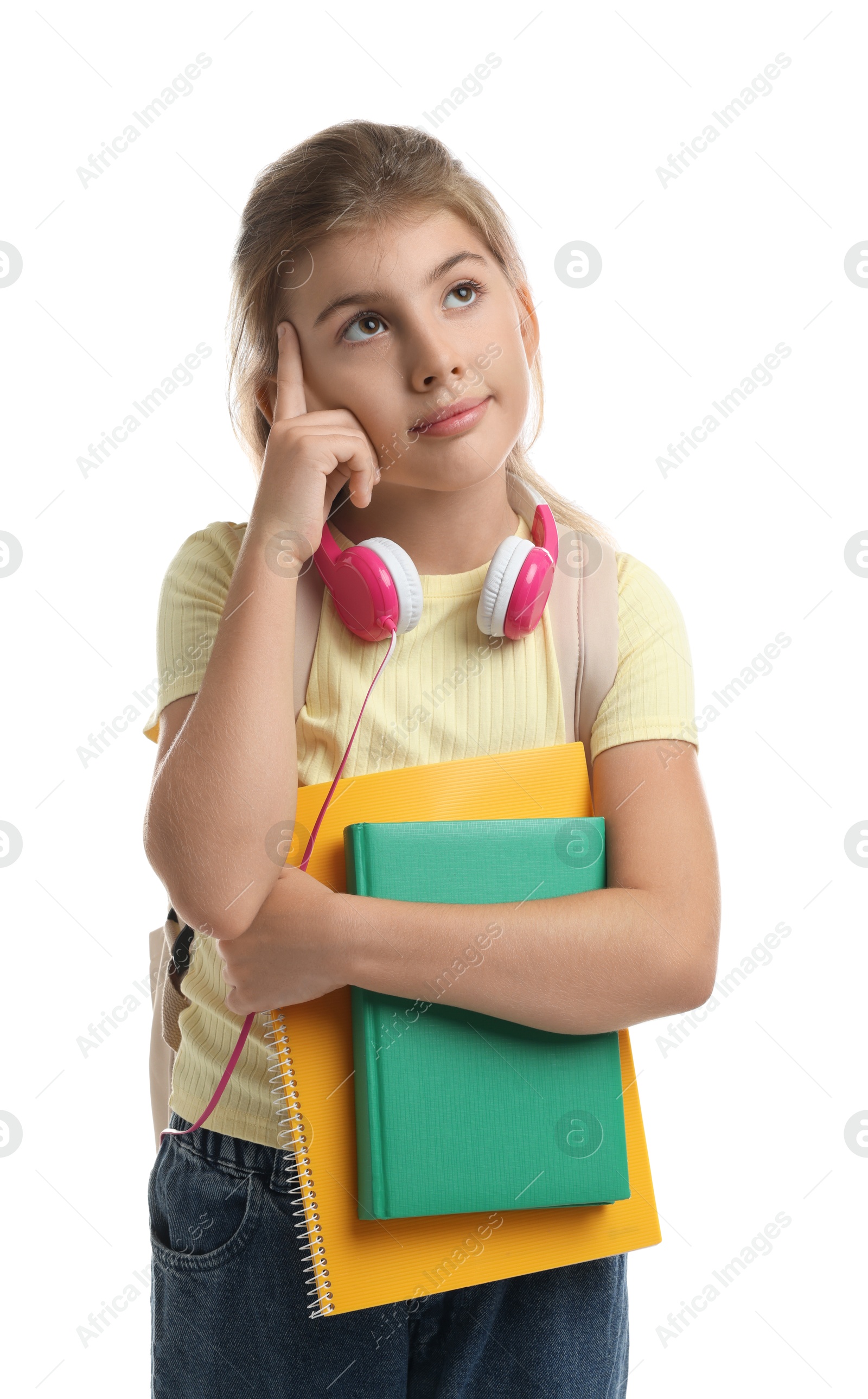 Photo of Portrait of girl with backpack and books on white background