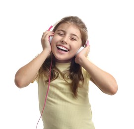 Portrait of cute girl listening to music on white background