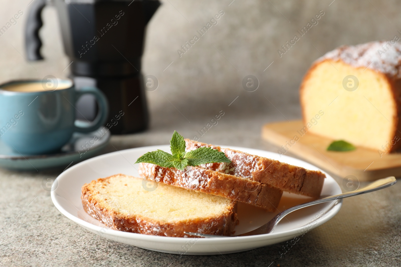 Photo of Freshly baked sponge cake and coffee on light grey table