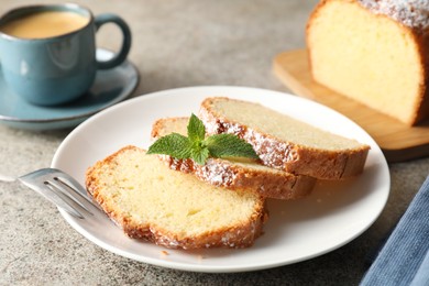 Photo of Freshly baked sponge cake and coffee on light grey table