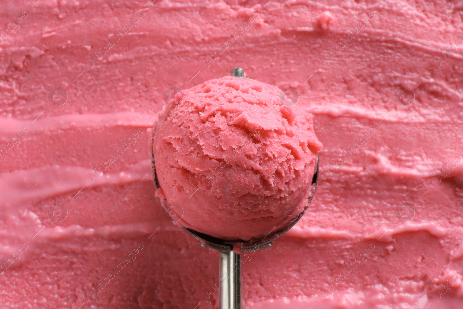 Photo of Scoop with tasty watermelon sorbet, top view