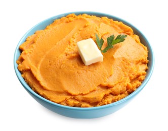 Photo of Tasty mashed sweet potato with butter and parsley in bowl isolated on white