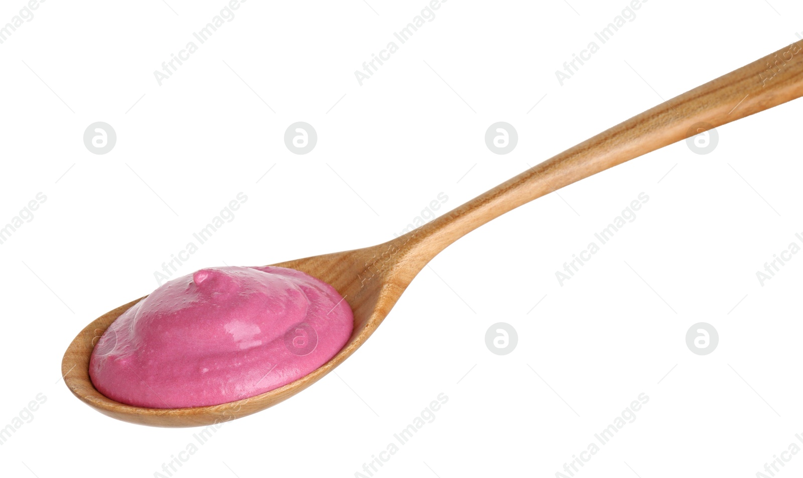 Photo of Tasty beetroot hummus in wooden spoon isolated on white