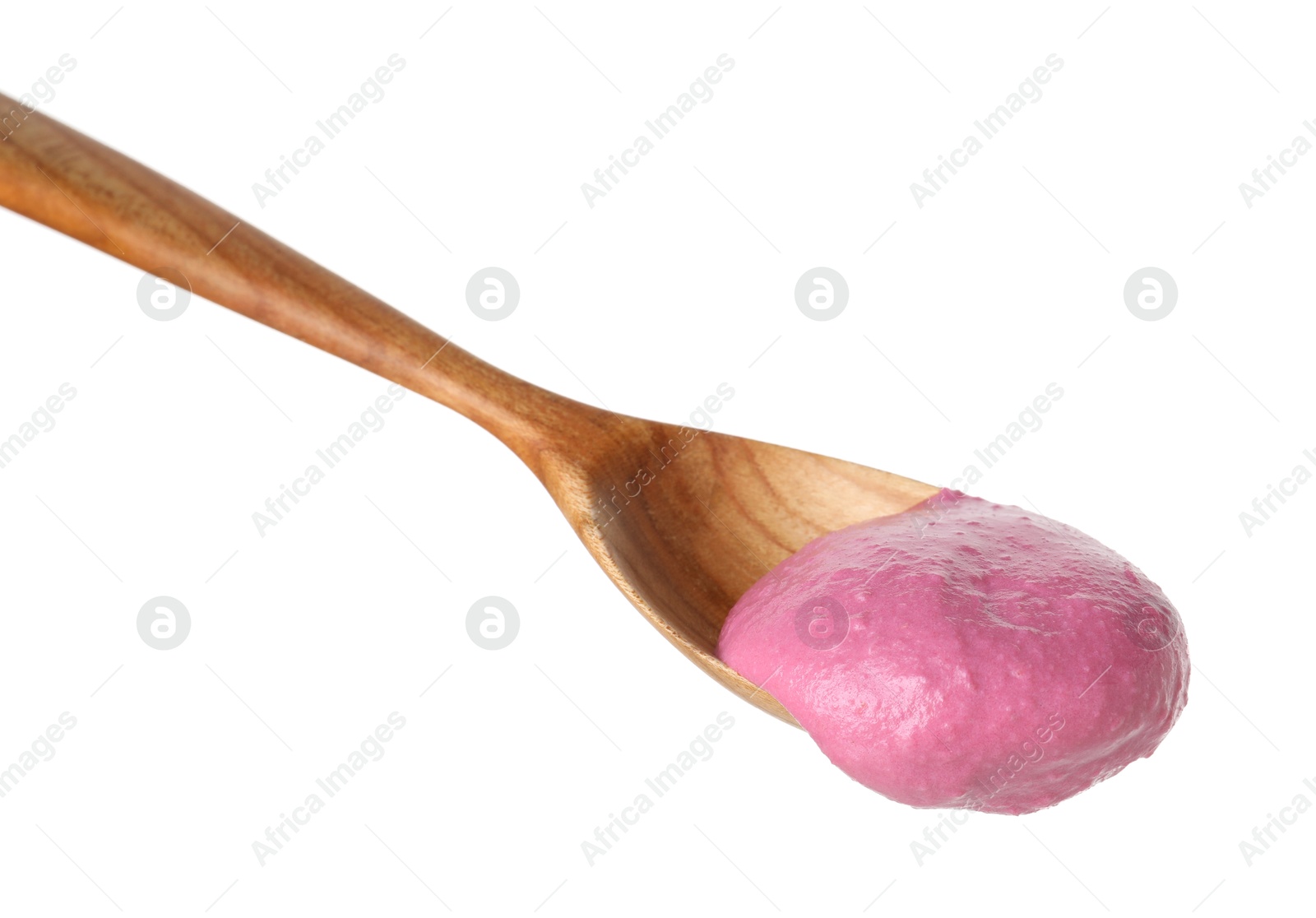 Photo of Tasty beetroot hummus in wooden spoon isolated on white