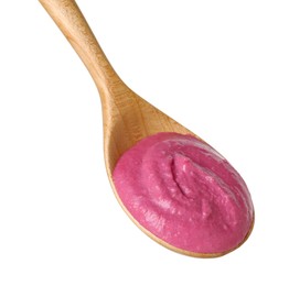 Photo of Tasty beetroot hummus in wooden spoon isolated on white