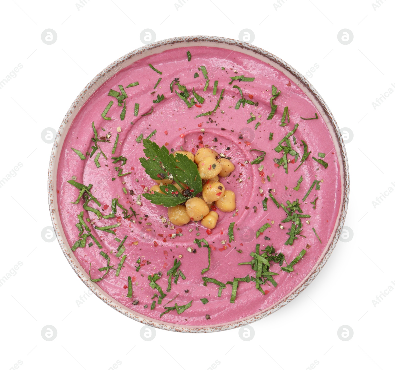 Photo of Tasty beetroot hummus and chickpeas in bowl isolated on white, top view