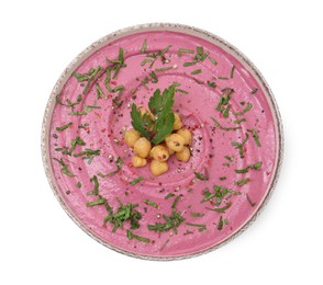 Photo of Tasty beetroot hummus and chickpeas in bowl isolated on white, top view