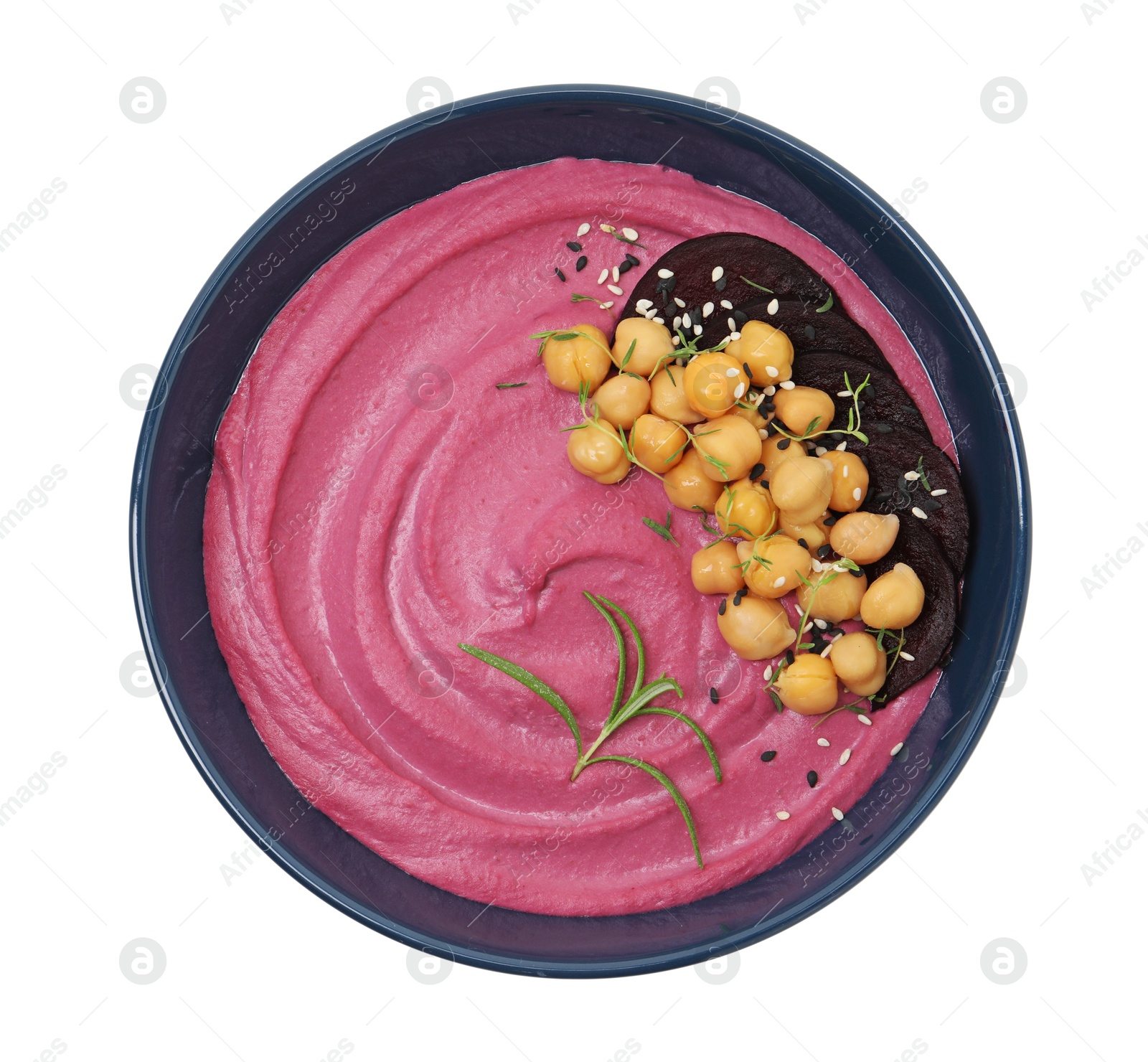 Photo of Tasty beetroot hummus and chickpeas in bowl isolated on white, top view