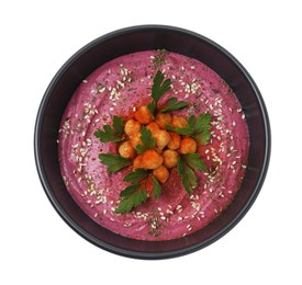 Photo of Tasty beetroot hummus and chickpeas in bowl isolated on white, top view