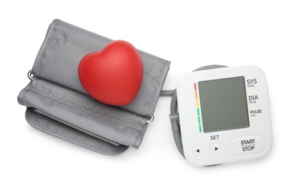 Photo of Blood pressure monitor and red decorative heart isolated on white, top view