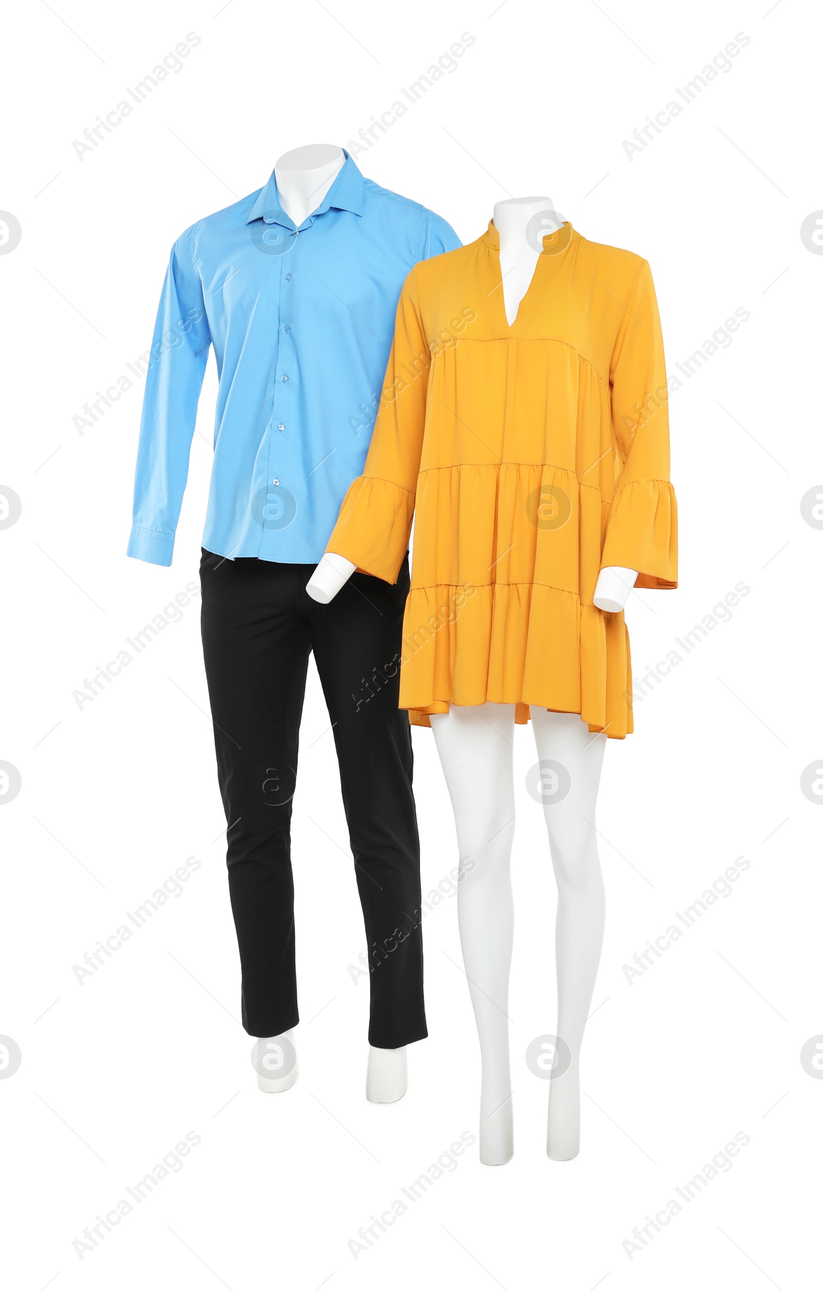 Photo of Female and male mannequins with stylish outfits isolated on white