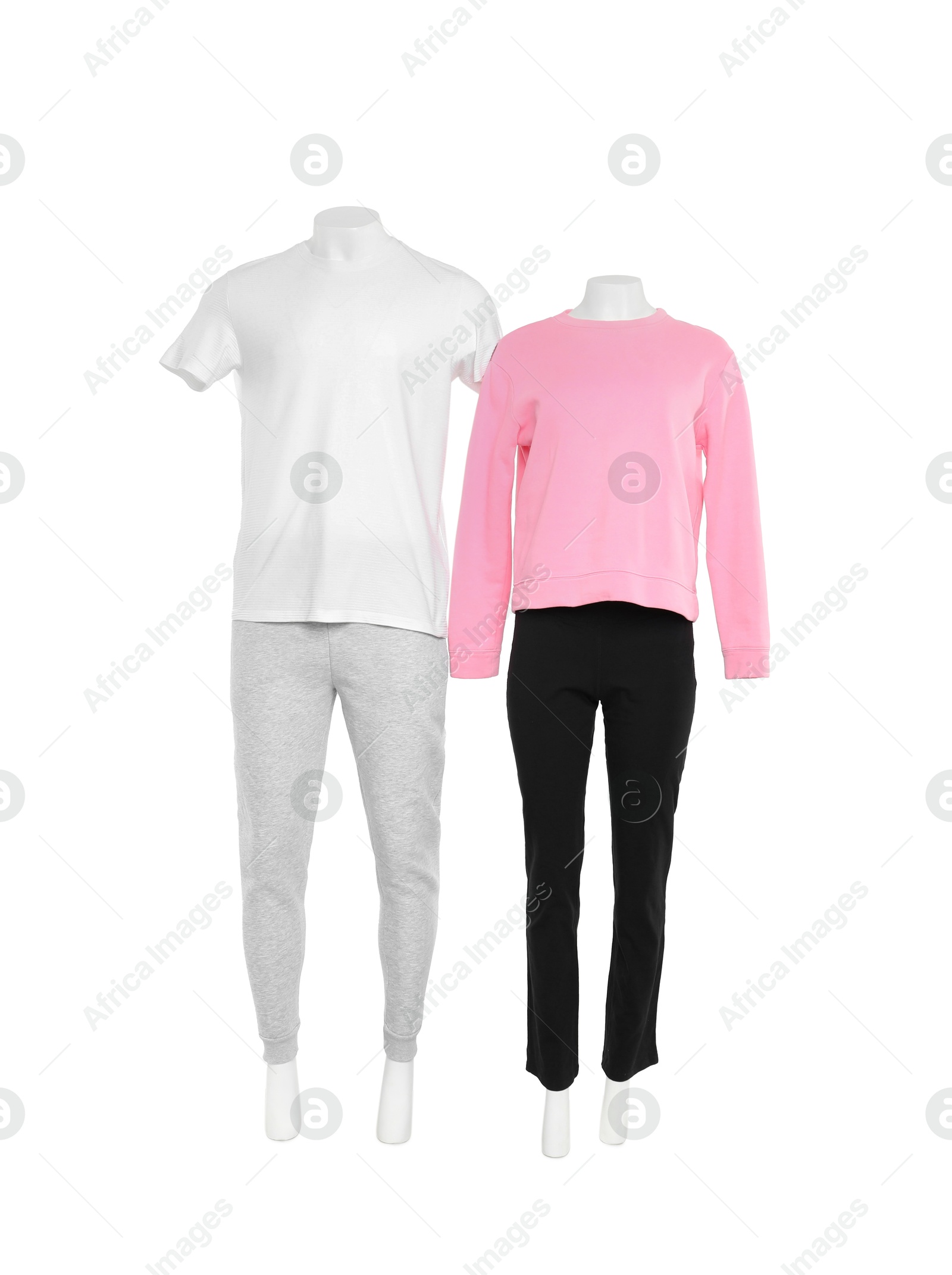 Photo of Female and male mannequins with stylish outfits isolated on white