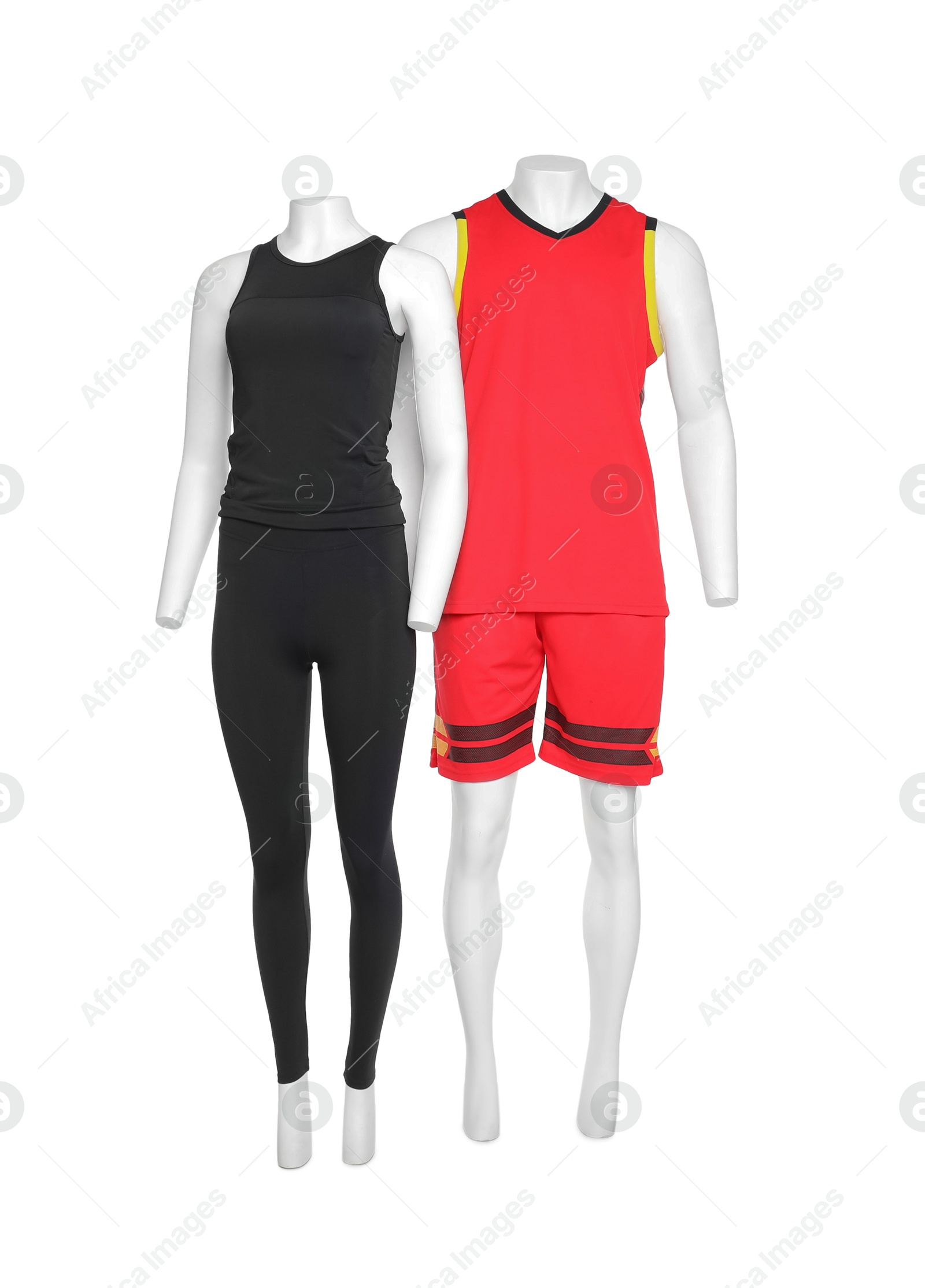 Photo of Female and male mannequins with stylish sports outfits isolated on white