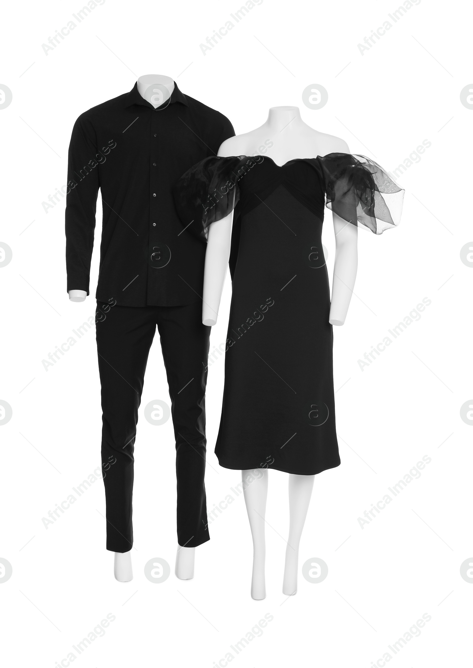 Photo of Female and male mannequins with stylish outfits isolated on white