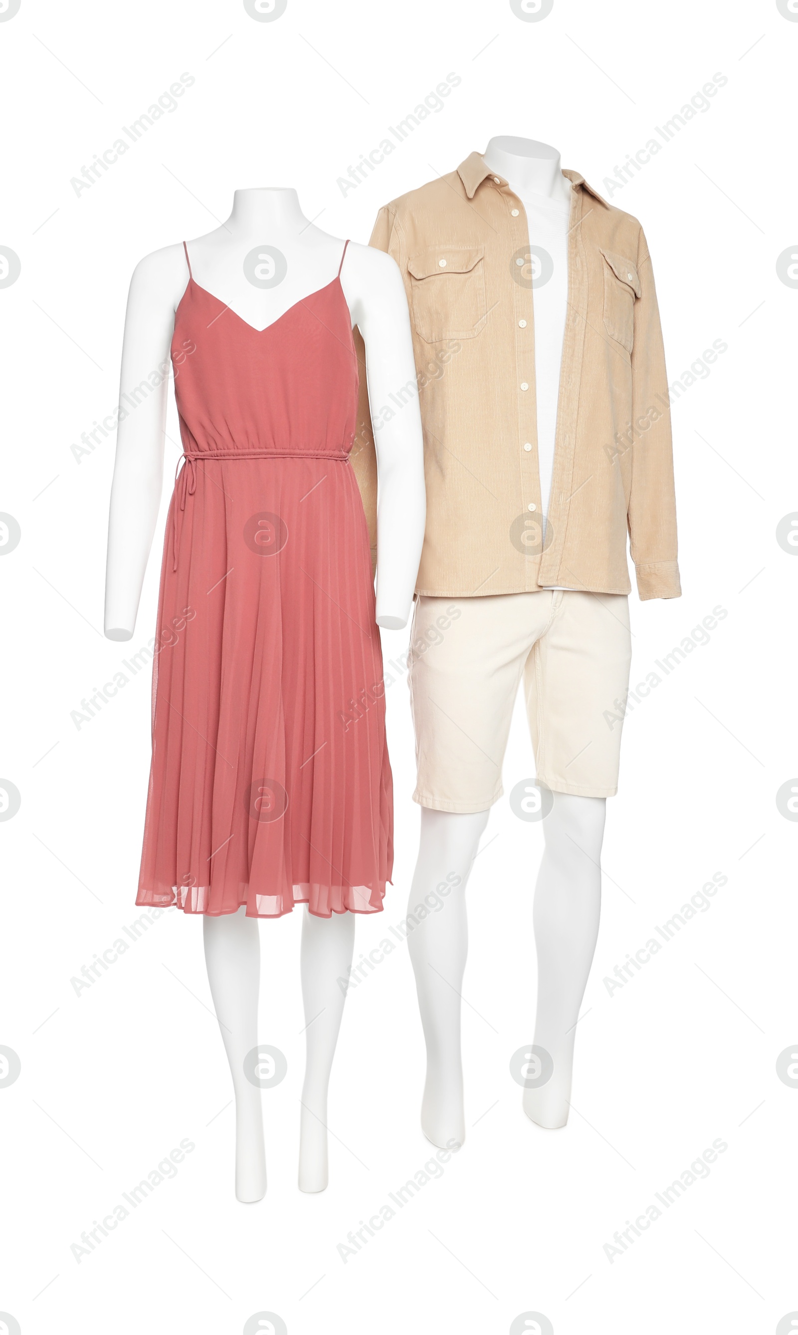 Photo of Female and male mannequins with stylish outfits isolated on white