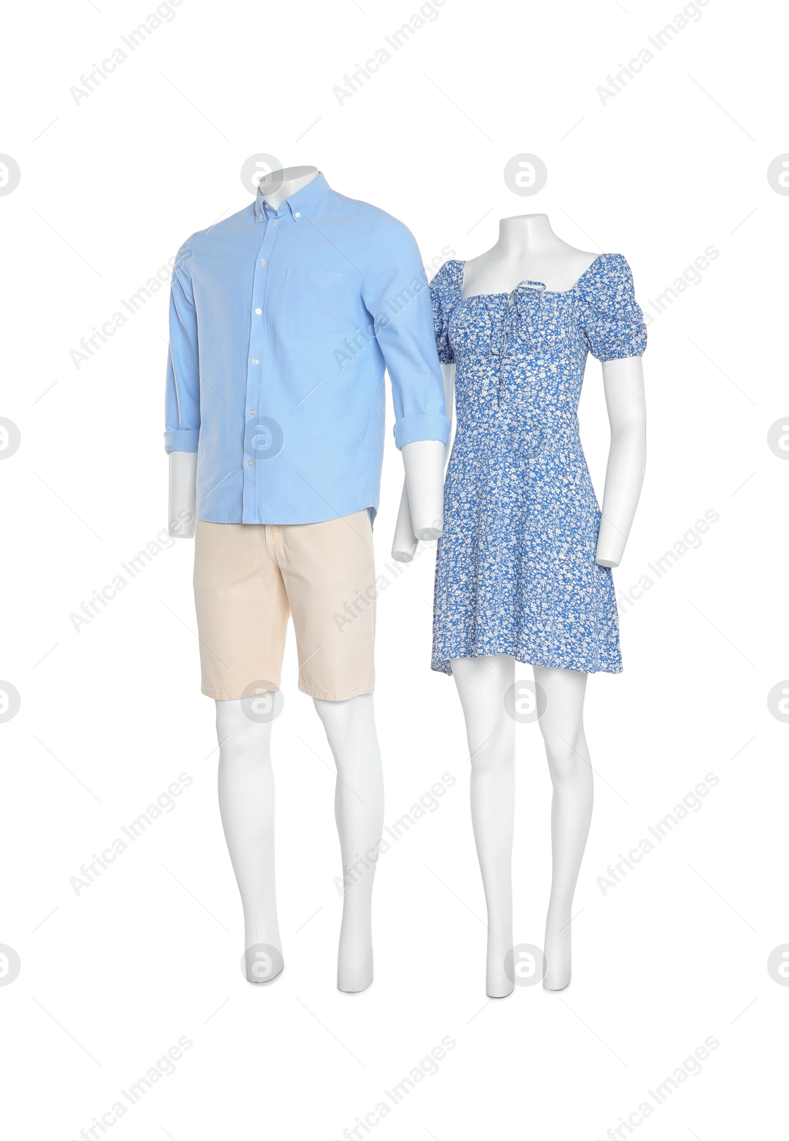 Photo of Female and male mannequins with stylish outfits isolated on white