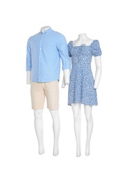 Photo of Female and male mannequins with stylish outfits isolated on white