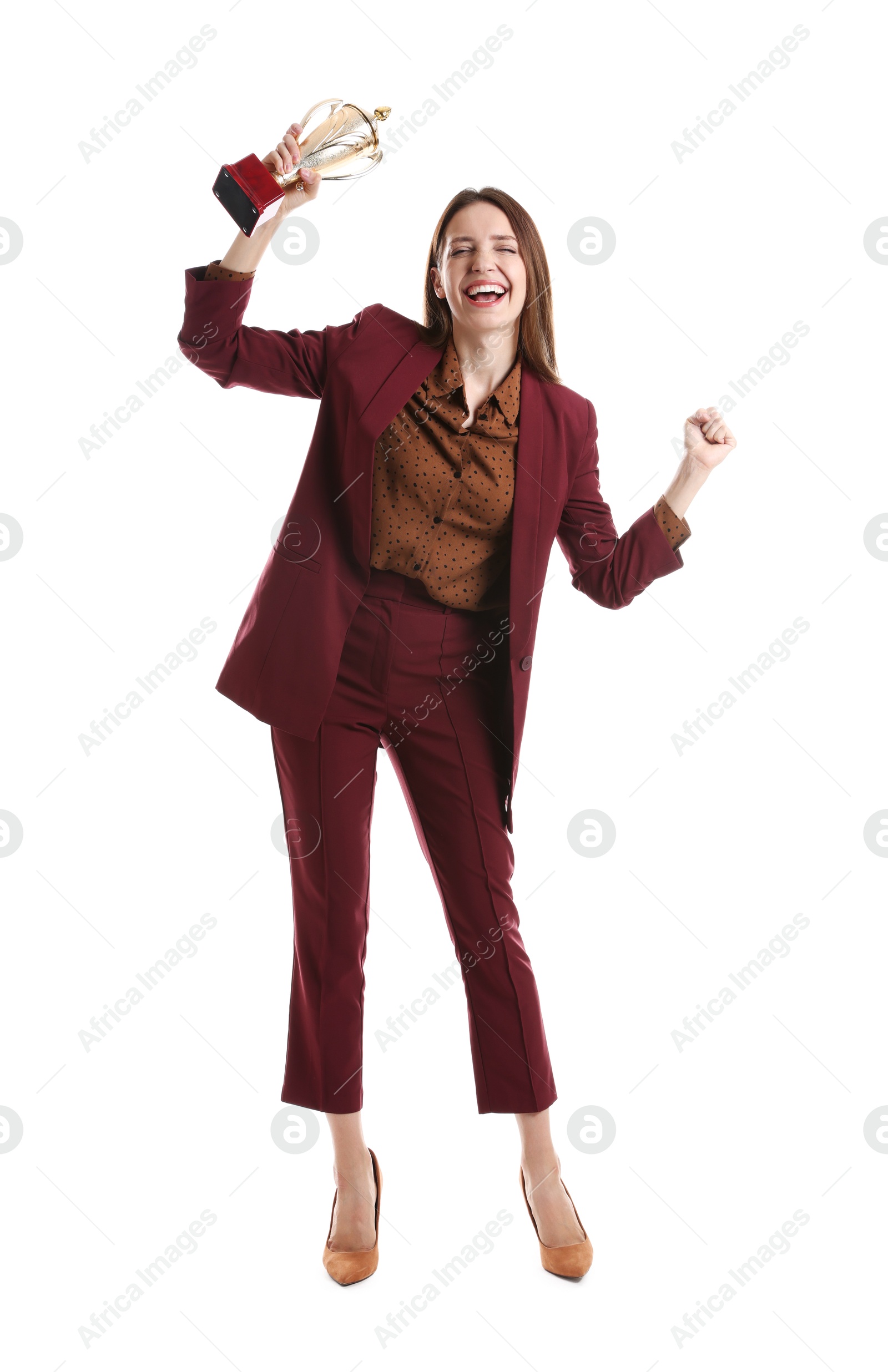 Photo of Happy winner with gold trophy cup on white background