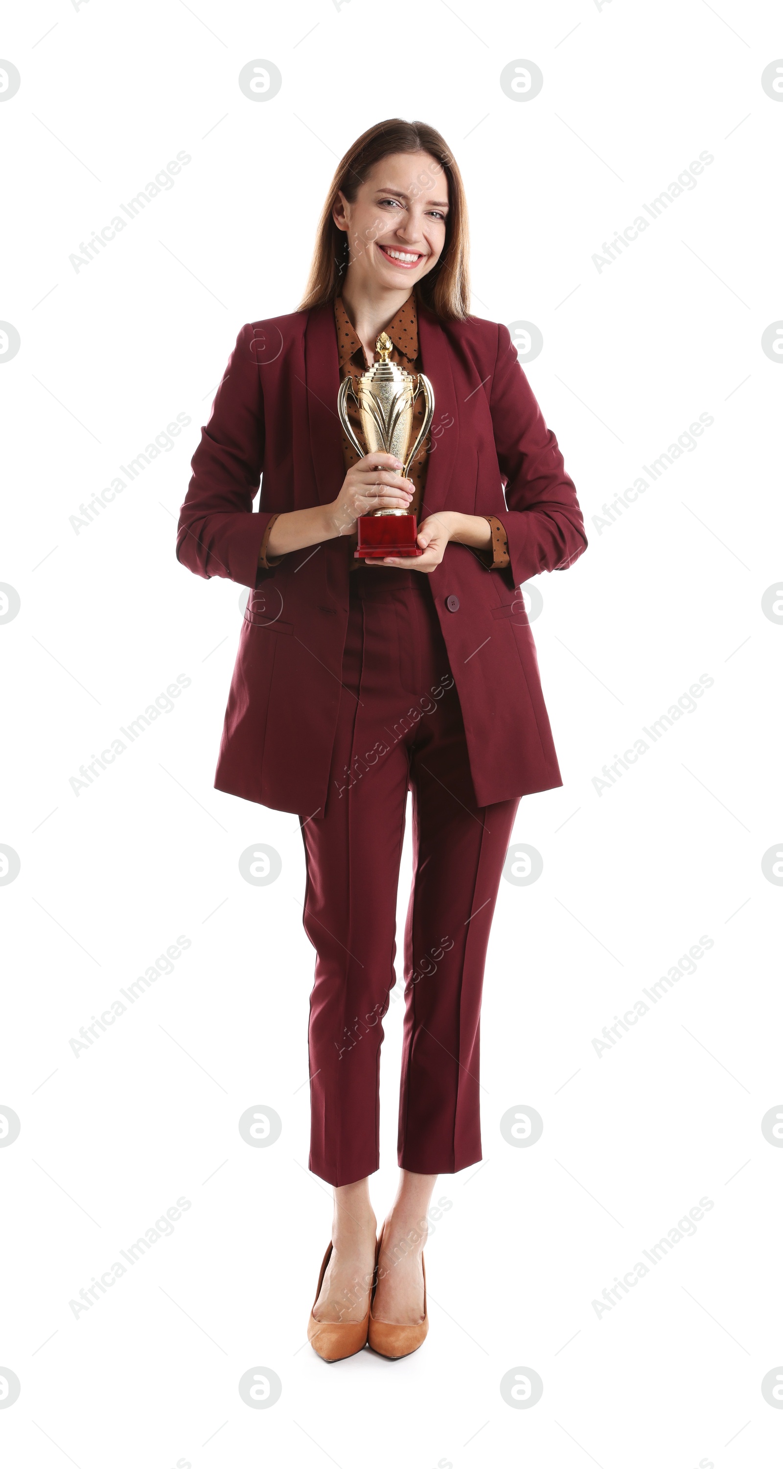 Photo of Happy winner with gold trophy cup on white background